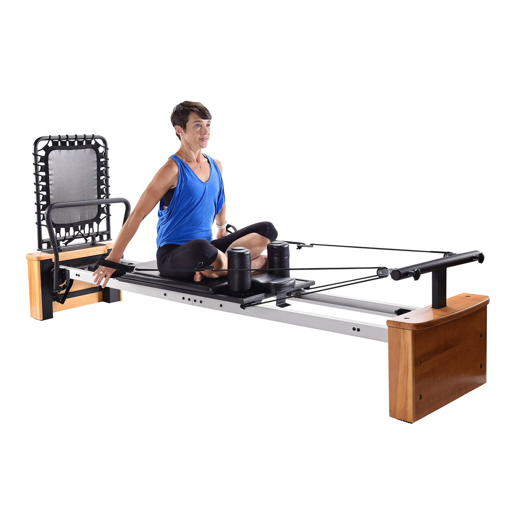 Stamina Products AeroPilates Board Reformer with Oak Wood Base – Studio Grade for Home Use with Cardio Rebounder, Adjustable Foot Bar, 4 Resistance Springs, and Workout DVD