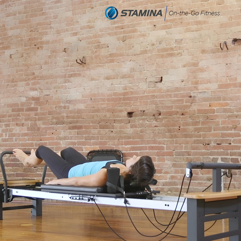 Stamina Products AeroPilates Board Reformer with Oak Wood Base – Studio Grade for Home Use with Cardio Rebounder, Adjustable Foot Bar, 4 Resistance Springs, and Workout DVD